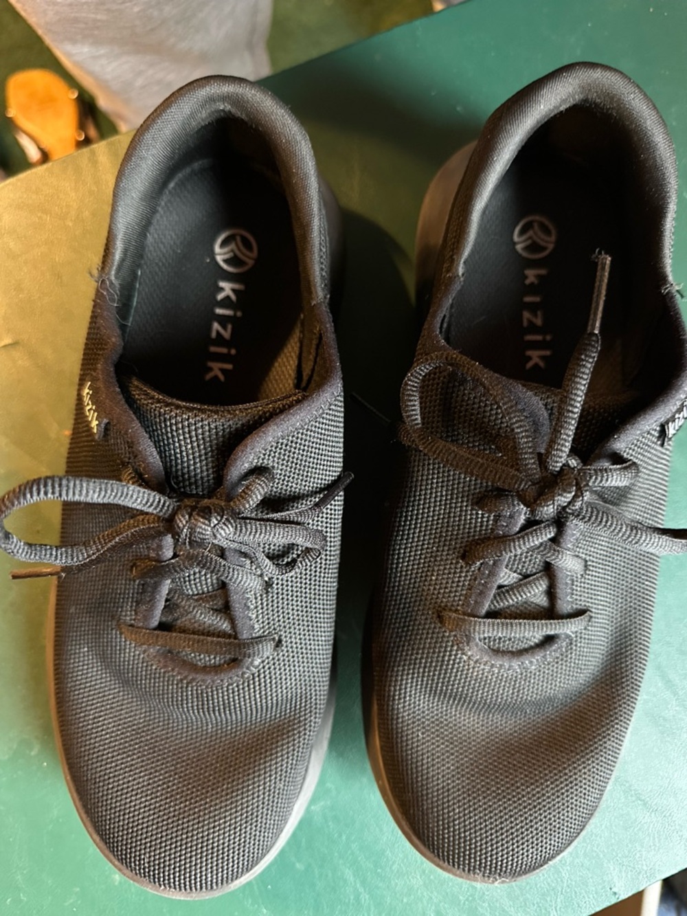 Kizik Black Slip-On Sneakers